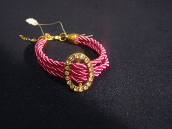 Pulseira fios dourados e rosa