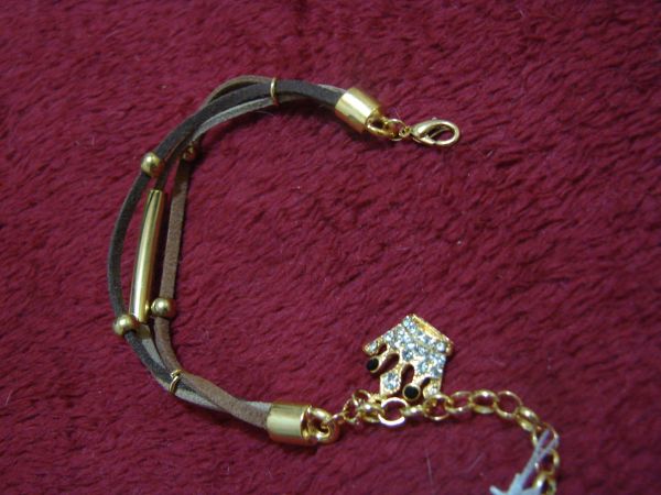 Pulseira marrom coroa