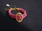 Pulseira fios dourados e rosa